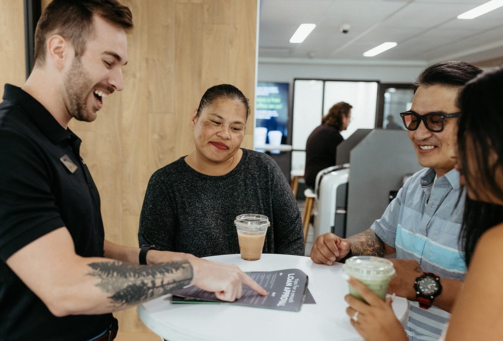 financial coach helping a credit union member